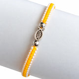 Pulsera en macramé amarilla