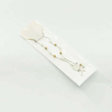 Denario en perla y acero